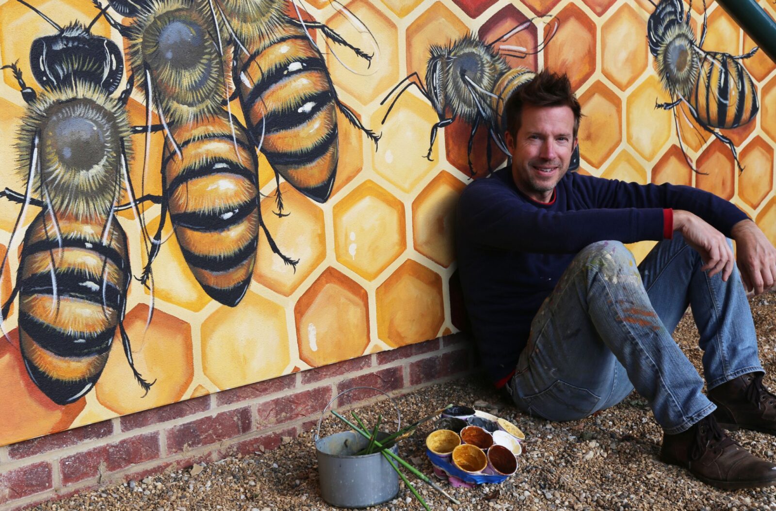 Town’s abuzz: International artist comes to Rifle to paint bee mural